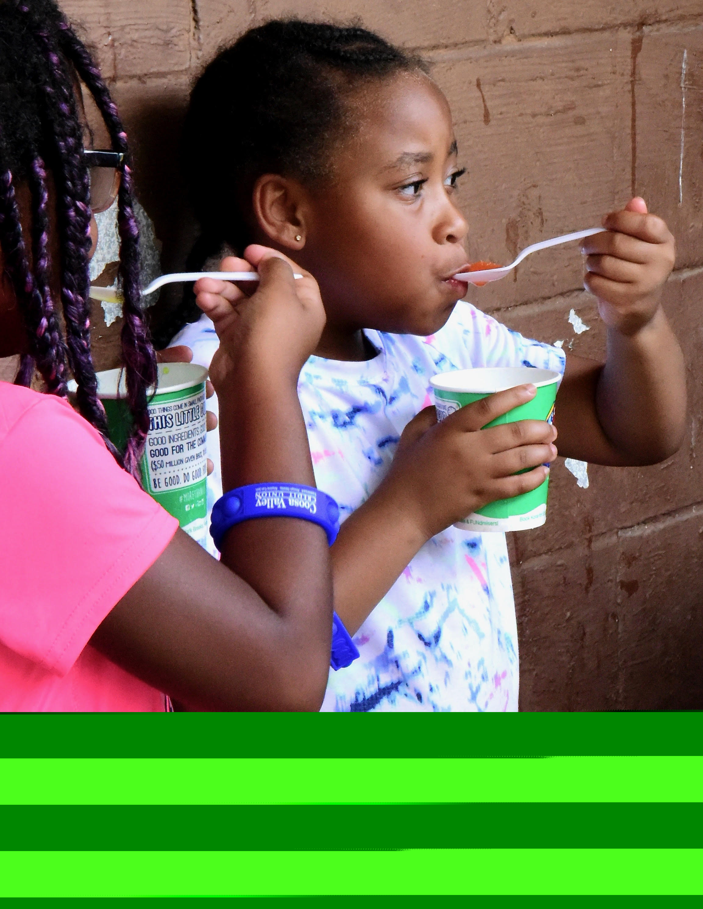 ELW youth enjoying treats at summer camp